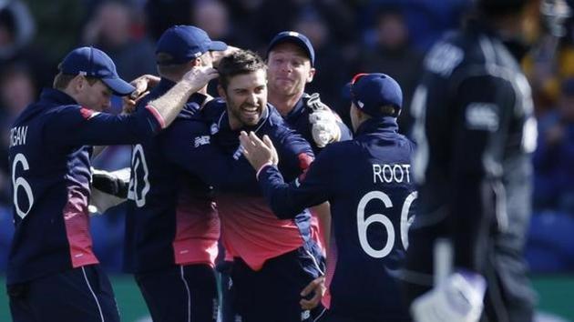 England cricket team's Mark Wood celebrates with Joe Root and teammates after taking the wicket of New Zealand national cricket team skipper Kane Williamson during their ICC Champions Trophy 2017 match in Cardiff, Wales, on Tuesday. (Reuters) England cricket team's Mark Wood celebrates with Joe Root and teammates after taking the wicket of New Zealand national cricket team skipper Kane Williamson during their ICC Champions Trophy 2017 match in Cardiff, Wales, on Tuesday. (Reuters)