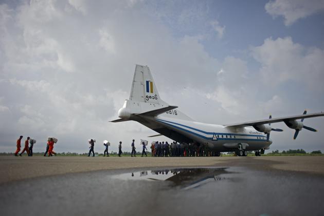 This file photo taken on August 5, 2015 shows a Myanmar Air Force Shaanxi Y-8 transport aircraft being unloaded at Sittwe airport in Rakhine state, similar to the aircraft carrying over 100 people that went missing between the southern city of Myeik and Yangon on June 7, 2017. (AFP Photo) This file photo taken on August 5, 2015 shows a Myanmar Air Force Shaanxi Y-8 transport aircraft being unloaded at Sittwe airport in Rakhine state, similar to the aircraft carrying over 100 people that went missing between the southern city of Myeik and Yangon on June 7, 2017. (AFP Photo)