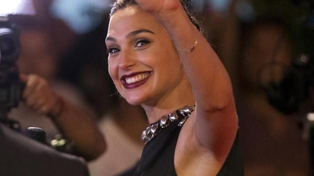 Actor Gal Gadot waves to cheering fans as she does interviews with journalists at the Latin American premiere of the film Wonder Woman, in Mexico City. (AP) Actor Gal Gadot waves to cheering fans as she does interviews with journalists at the Latin American premiere of the film Wonder Woman, in Mexico City. (AP)
