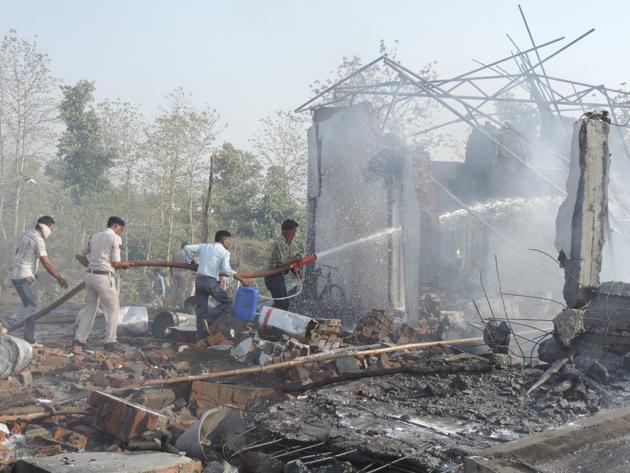 Rescuers try to douse fire at a firecracker factory in Balaghat, Madhya Pradesh on Wednesday. Police arrested owner of the factory from Chhattisgarh on Friday. (AP Photo) Rescuers try to douse fire at a firecracker factory in Balaghat, Madhya Pradesh on Wednesday. Police arrested owner of the factory from Chhattisgarh on Friday. (AP Photo)