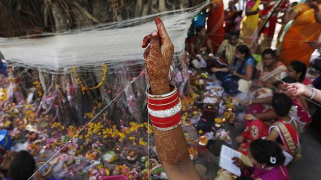Thousands of married women observe `Vat Savitri’ puja at various parts of the country. Vat Savitri Vrat Puja or Savitri Brata also known as Savitri Amavasya is an important Hindu festival celebrated by the married women for the long life of their husbands. (Ajit Solanki / AP)