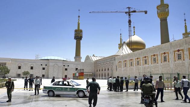 Police officers control the scene, around of shrine of late Iranian revolutionary founder Ayatollah Khomeini, after an assault by several attackers in Tehran, just outside Tehran, Iran, Wednesday, June 7, 2017. Suicide bombers and gunmen stormed into Iran's parliament and targeted the shrine of Ayatollah Ruhollah Khomeini on Wednesday, killing a security guard and wounding several other people in rare twin attacks. (AP Photo) Police officers control the scene, around of shrine of late Iranian revolutionary founder Ayatollah Khomeini, after an assault by several attackers in Tehran, just outside Tehran, Iran, Wednesday, June 7, 2017. Suicide bombers and gunmen stormed into Iran's parliament and targeted the shrine of Ayatollah Ruhollah Khomeini on Wednesday, killing a security guard and wounding several other people in rare twin attacks. (AP Photo)