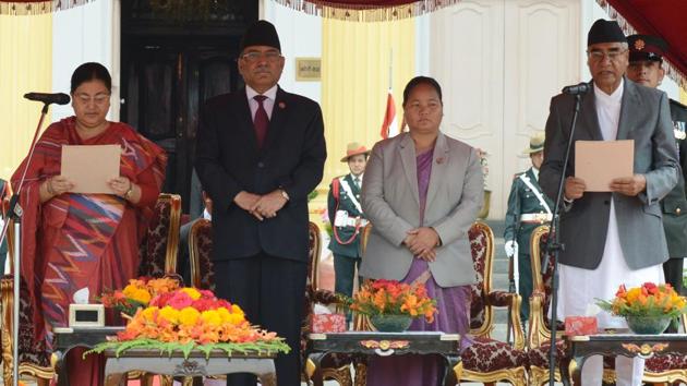 Nepal's newly elected Prime Minister Sher Bahadur Deuba (right) is sworn in by President Bidhya Bhandari (left), as outgoing prime minister Pushpa Kamal Dahal “Prachanda” (2nd from left) looks on at the President's House in Kathmandu on June 7, 2017. Nepal's parliament on June 6 elected the three-time former prime minister to the top post again, the tenth time in just over a decade the leadership has changed hands in the Himalayan nation. (AFP) Nepal's newly elected Prime Minister Sher Bahadur Deuba (right) is sworn in by President Bidhya Bhandari (left), as outgoing prime minister Pushpa Kamal Dahal “Prachanda” (2nd from left) looks on at the President's House in Kathmandu on June 7, 2017. Nepal's parliament on June 6 elected the three-time former prime minister to the top post again, the tenth time in just over a decade the leadership has changed hands in the Himalayan nation. (AFP)