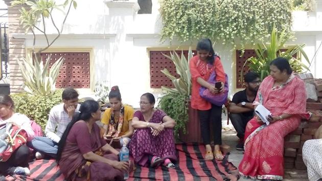 Ranju Bhandari (centre) protests outside her home in Jaipur. (HT Photo) Ranju Bhandari (centre) protests outside her home in Jaipur. (HT Photo)