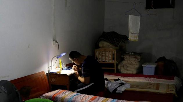 Student Wang Xiaolong does homework in a rented home near Maotanchang Middle School at midnight, in Maotanchang town of Luan, Anhui province, China. The town is famed for a middle school that puts students through rigorous 14-hour days in preparation for the annual national college entrance exam also known as Gaokao, which begins on Wednesday.Usually spread over two days, this exam is a prerequisite for entry into the undergraduate level, which lasts for about nine hours per day depending upon the province. (REUTERS) Student Wang Xiaolong does homework in a rented home near Maotanchang Middle School at midnight, in Maotanchang town of Luan, Anhui province, China. The town is famed for a middle school that puts students through rigorous 14-hour days in preparation for the annual national college entrance exam also known as Gaokao, which begins on Wednesday.Usually spread over two days, this exam is a prerequisite for entry into the undergraduate level, which lasts for about nine hours per day depending upon the province. (REUTERS)