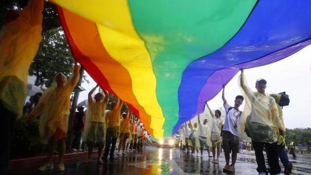 Participants carry a rainbow flag during the 2008 Taiwan Gay Pride Parade titled “Run The Rainbow Way” in Taipei in September 2008. (Reuters) Participants carry a rainbow flag during the 2008 Taiwan Gay Pride Parade titled “Run The Rainbow Way” in Taipei in September 2008. (Reuters)