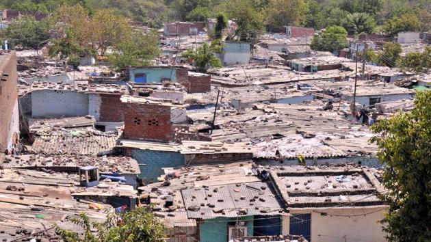 Colony No 4 in Industrial Area, Phase I, is the largest of the three remaining slums in the city that await rehabilitation.(HT Photo)