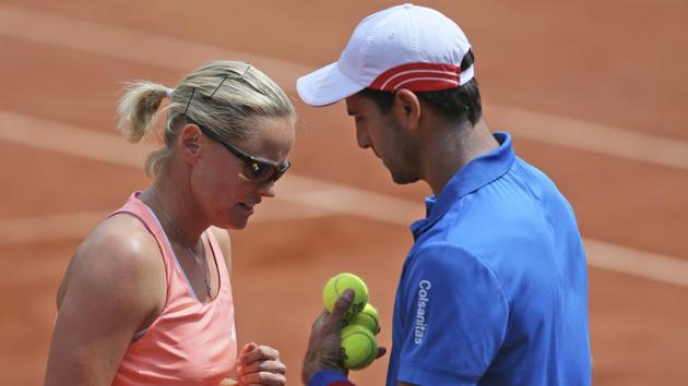 Anna-Lena Groenefeld of Germany and Robert Farah of Colombia talk tactics in their mixed doubles final. (AP) Anna-Lena Groenefeld of Germany and Robert Farah of Colombia talk tactics in their mixed doubles final. (AP)