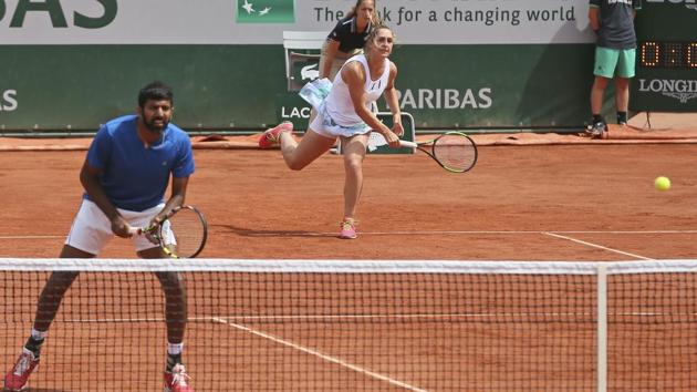 Canada's Gabriela Dabrowski and India's Rohan Bopanna return against Anna-Lena Groenefeld of Germany and Robert Farah of Colombia. (AP) Canada's Gabriela Dabrowski and India's Rohan Bopanna return against Anna-Lena Groenefeld of Germany and Robert Farah of Colombia. (AP)