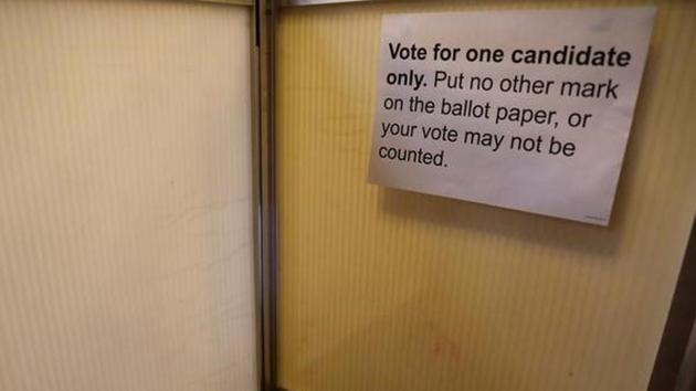 Instructions are seen inside a polling station on general election day. (Neil Hall / Reuters) Instructions are seen inside a polling station on general election day. (Neil Hall / Reuters)