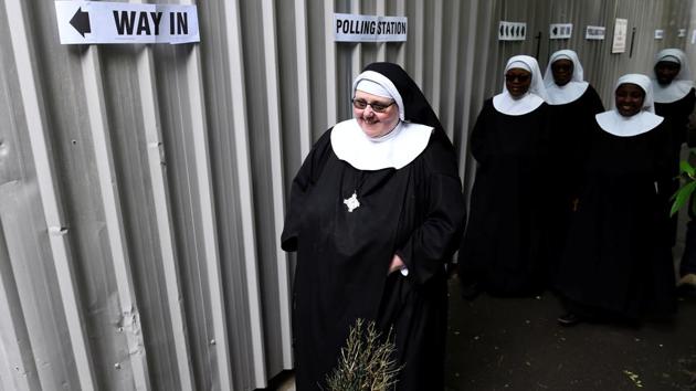Nuns arrive to vote at a polling station in Hyde Park. (Clodagh Kilcoyne / REUTERS) Nuns arrive to vote at a polling station in Hyde Park. (Clodagh Kilcoyne / REUTERS)