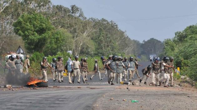 Farmers have been agitating for the establishment of a minimum support price for vegetables and milk, besides loan waivers, since July 1. The outrage only grew in intensity after the police firing on Tuesday. (Mujeeb Faruqui/HT Photo)