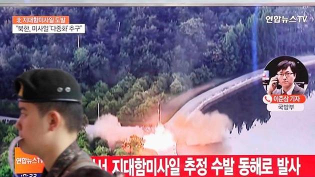 A South Korean soldier walks past a TV broadcast of a news report on North Korea firing what appeared to be several land-to-ship missiles off its east coast on Thursday. (Reuters Photo) A South Korean soldier walks past a TV broadcast of a news report on North Korea firing what appeared to be several land-to-ship missiles off its east coast on Thursday. (Reuters Photo)