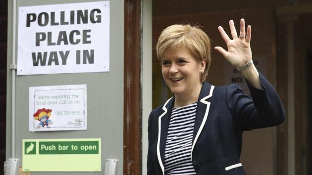 Scottish First Minister Nicola Sturgeon waves as she arrives to cast her vote in the general election at a polling station at Broomhouse Community Hall in Glasgow . (Andrew Milligan / AP) Scottish First Minister Nicola Sturgeon waves as she arrives to cast her vote in the general election at a polling station at Broomhouse Community Hall in Glasgow . (Andrew Milligan / AP)