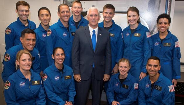 US Vice-President Mike Pence poses for a group photograph with NASA's 12 new astronaut candidates at NASA’s Johnson Space Center in Houston. Indian American Raja Chari is kneeling on the extreme right.(REUTERS/ NASA)