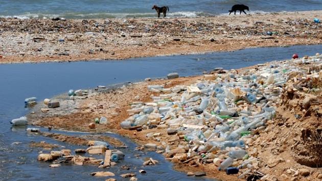 Sewage outlet and empty plastic bottles near the public beach in Khaldeh near Beirut, Lebanon. (Mohamed Azakir/REUTERS)