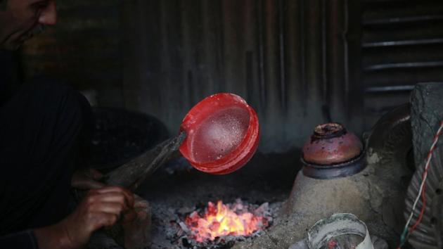 These copper utensils have been, throughout history, extensively used in Kashmiri households. But in the recent past, observers say, the usage has seen some decline. (Waseem Andrabi/HT Photo)