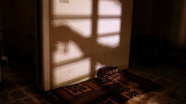 The shadow of a member of the Iraqi Army's Armoured Division is seen as he opens a steel gate to a room used as a cell for men, inside a prison compound of Islamic State militants in western Mosul, Iraq. Islamic State built prison cells inside an ordinary villa, part of the group’s tactic of boosting the safety of its jails and security centres by concealing them among regular houses. According to officials, only 4 sq. km of area is currently under Islamic State as Iraqi forces penetrate further to regain control of the region. (Alkis Konstantinidis /REUTERS) The shadow of a member of the Iraqi Army's Armoured Division is seen as he opens a steel gate to a room used as a cell for men, inside a prison compound of Islamic State militants in western Mosul, Iraq. Islamic State built prison cells inside an ordinary villa, part of the group’s tactic of boosting the safety of its jails and security centres by concealing them among regular houses. According to officials, only 4 sq. km of area is currently under Islamic State as Iraqi forces penetrate further to regain control of the region. (Alkis Konstantinidis /REUTERS)