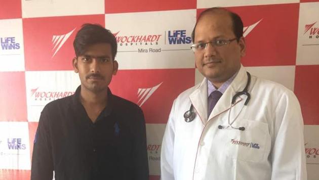 Bar cashier Dilip Verma (left). (HT Photo) Bar cashier Dilip Verma (left). (HT Photo)