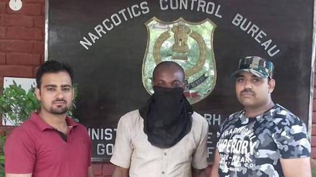 The accused in custody of the Narcotics Control Bureau in Chandigarh on Thursday. (HT Photo) The accused in custody of the Narcotics Control Bureau in Chandigarh on Thursday. (HT Photo)