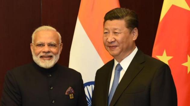 PM Narendra Modi meets Chinese President Xi Jinping on the margins of the SCO Summit in Astana, Kazakhstan.(MEA India/Twitter)
