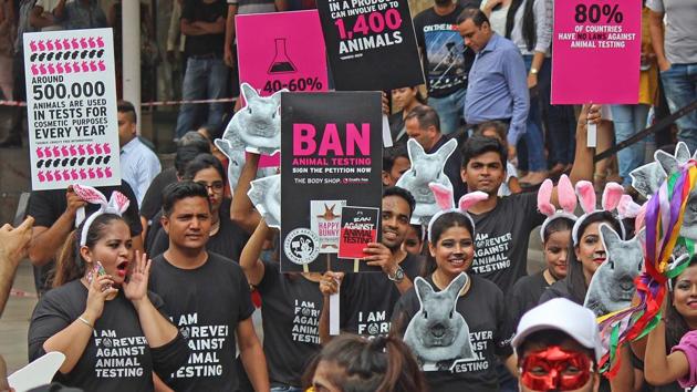 Animal lovers and activists take part in a rally. (Satyabrata Tripathy/HT Photo) 