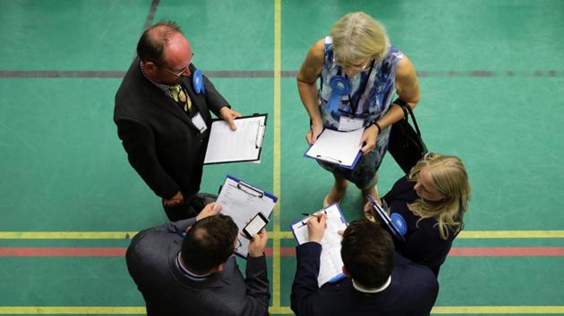 Party activists wait at a counting centre for Britain's general election in Hastings. Shock exit polls have disrupted the expectations of the Conservatives strengthening their majority in the parliament ahead of scheduled Brexit talks later this month. (Kevin Coombs/REUTERS) Party activists wait at a counting centre for Britain's general election in Hastings. Shock exit polls have disrupted the expectations of the Conservatives strengthening their majority in the parliament ahead of scheduled Brexit talks later this month. (Kevin Coombs/REUTERS)