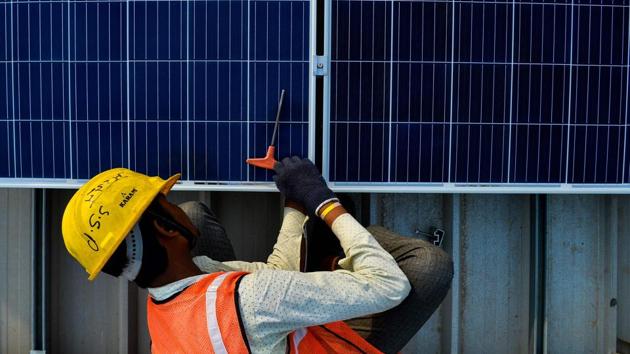 Five year ago solar companies were producing a kilowatt-hour for Rs.7. It’s now down to Rs.2.44 - even cheaper than coal. (Chandan Khanna/APF)