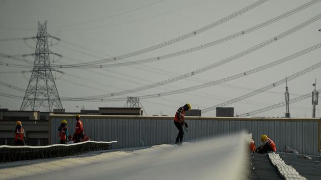 Across India, there are villages where households get loans to buy a solar power system to light up a few light bulbs in their homes. (Chandan Khanna/APF)