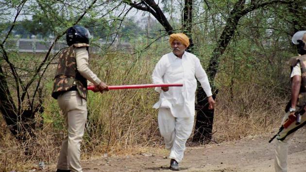 Farmers stage protest at Indore-Bhopal highway on Friday. Situation remained tense in the state after five farmers were killed in police firing in Mandsaur. (PTI Photo) Farmers stage protest at Indore-Bhopal highway on Friday. Situation remained tense in the state after five farmers were killed in police firing in Mandsaur. (PTI Photo)