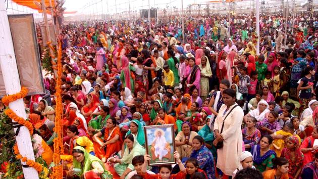 Devotees of self styled godman Rampal come to pay their respects to him on Kabir Jayanti in Rohtak on Friday. (Manoj Dhaka/HT Photo) Devotees of self styled godman Rampal come to pay their respects to him on Kabir Jayanti in Rohtak on Friday. (Manoj Dhaka/HT Photo)