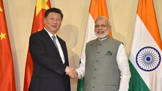 PM Narendra Modi with China’s President Xi Jinping before the BRICS Summit, in Goa on October 15, 2016. (File Photo/PIB) PM Narendra Modi with China’s President Xi Jinping before the BRICS Summit, in Goa on October 15, 2016. (File Photo/PIB)