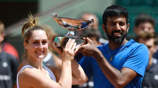 India's Rohan Bopanna (R) and Canada's Gabriela Dabrowski pose with their trophy after winning the French Open mixed doubles title. (AFP) India's Rohan Bopanna (R) and Canada's Gabriela Dabrowski pose with their trophy after winning the French Open mixed doubles title. (AFP)