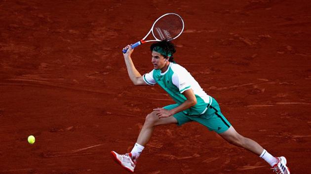 Thiem, who thrashed the defending champion Novak Djokovic in the quarter-finals, started brightly in the early evening sunshine but his challenge disappeared into the encroaching shadows. (Getty Images) Thiem, who thrashed the defending champion Novak Djokovic in the quarter-finals, started brightly in the early evening sunshine but his challenge disappeared into the encroaching shadows. (Getty Images)
