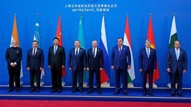 (From left) Indian Prime Minister Narendra Modi, Uzbek President Shavkat Mirziyoyev, Chinese President Xi Jinping, Kazakh President Nursultan Nazarbayev, Russian President Vladimir Putin, Tajik President Emomali Rakhmon, Kyrgyz President Almazbek Atambayev and Pakistani Prime Minister Nawaz Sharif pose for a photo at a summit of the Shanghai Cooperation Organization in Astana, Kazakstan, Friday, June 9, 2017. (AP) (From left) Indian Prime Minister Narendra Modi, Uzbek President Shavkat Mirziyoyev, Chinese President Xi Jinping, Kazakh President Nursultan Nazarbayev, Russian President Vladimir Putin, Tajik President Emomali Rakhmon, Kyrgyz President Almazbek Atambayev and Pakistani Prime Minister Nawaz Sharif pose for a photo at a summit of the Shanghai Cooperation Organization in Astana, Kazakstan, Friday, June 9, 2017. (AP)