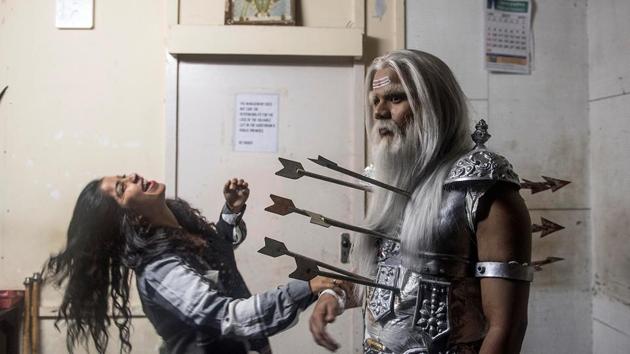 Performers share a light moment backstage. (Satish Bate/HT ) 