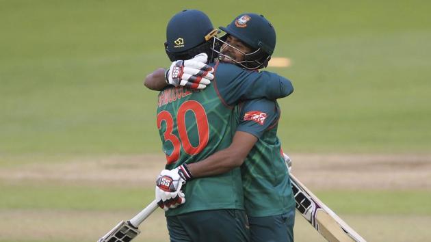Bangladesh's Mosaddek Hossain (R) and Mahmudullah celebrate after winning the ICC Champions Trophy Group A match against New Zealand at Sophia Gardens, Cardiff on Friday. (AP) Bangladesh's Mosaddek Hossain (R) and Mahmudullah celebrate after winning the ICC Champions Trophy Group A match against New Zealand at Sophia Gardens, Cardiff on Friday. (AP)
