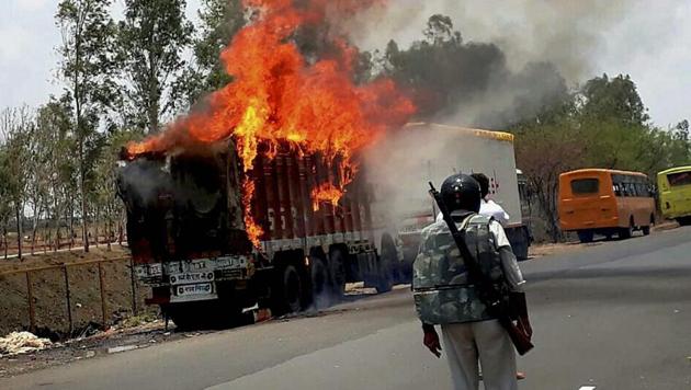 Farmers torch vehicles during a protest in Phanda near Bhopal on June 9. (PTI Photo) Farmers torch vehicles during a protest in Phanda near Bhopal on June 9. (PTI Photo)