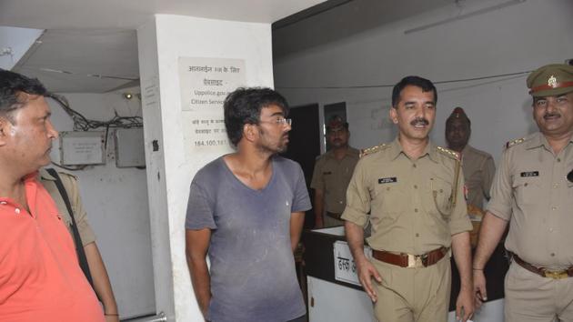 Anuj Tyagi in police custody. (Sakib Ali/HT Photo) Anuj Tyagi in police custody. (Sakib Ali/HT Photo)