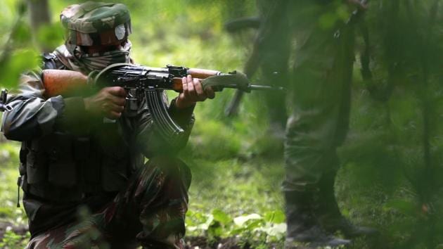 Soldiers take position during an operation against militants in Kashmir’s Shopian district. (Waseem Andrabi / HT Photo) Soldiers take position during an operation against militants in Kashmir’s Shopian district. (Waseem Andrabi / HT Photo)