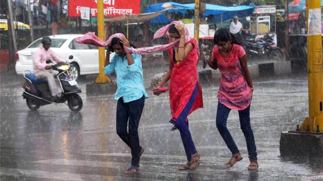 Low-lying areas in some cities experienced water-logging as gutters and storm water drains were flooded in a short time and water gushed out onto the streets. (PTI REPRESENTATIVE PHOTO) Low-lying areas in some cities experienced water-logging as gutters and storm water drains were flooded in a short time and water gushed out onto the streets. (PTI REPRESENTATIVE PHOTO)