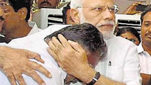 Prime Minister Narendra Modi consoles O Panneerselvam after paying his last respects to Tamil Nadu's former chief minister J Jayalalithaa at Rajaji Hall in Chennai on December 6, 2016.(PTI File Photo) Prime Minister Narendra Modi consoles O Panneerselvam after paying his last respects to Tamil Nadu's former chief minister J Jayalalithaa at Rajaji Hall in Chennai on December 6, 2016.(PTI File Photo)