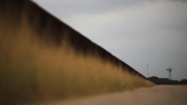 The US-Mexico border fence is seen in McAllen, Texas. (REUTERS) The US-Mexico border fence is seen in McAllen, Texas. (REUTERS)