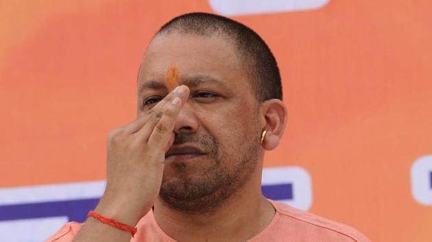 Chief minister Yogi Adityanath does yoga in Raj Bhavan ahead of the June 21 International Yoga Day.(Subhankar Chakraborty/HT PHOTO)