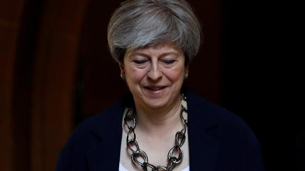Britain's Prime Minister Theresa May leaves after a church service in Sonning, Britain on June 11. (REUTERS) Britain's Prime Minister Theresa May leaves after a church service in Sonning, Britain on June 11. (REUTERS)