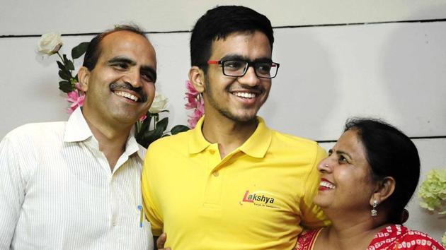 Sarvesh Mehtani (centre) from Haryana’s Panchkula secured the All India Rank (AIR) 1 in Joint Entrance Examination (JEE) Advanced 2017, the results of which were declared on Sunday.(Keshav Singh/HT Photo) Sarvesh Mehtani (centre) from Haryana’s Panchkula secured the All India Rank (AIR) 1 in Joint Entrance Examination (JEE) Advanced 2017, the results of which were declared on Sunday.(Keshav Singh/HT Photo)