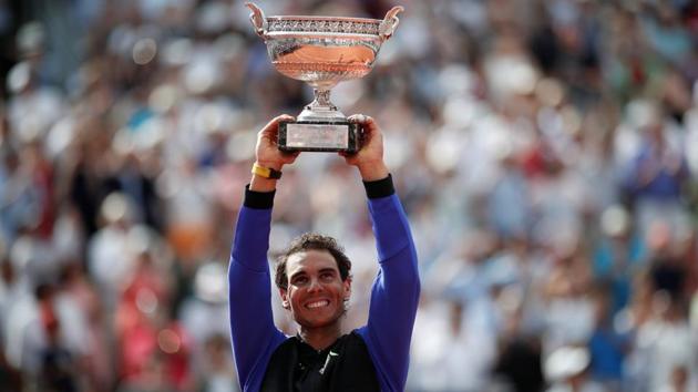 Spain's Rafael Nadal celebrates with the trophy after winning the final against Switzerland's Stan Wawrinka. (REUTERS) Spain's Rafael Nadal celebrates with the trophy after winning the final against Switzerland's Stan Wawrinka. (REUTERS)