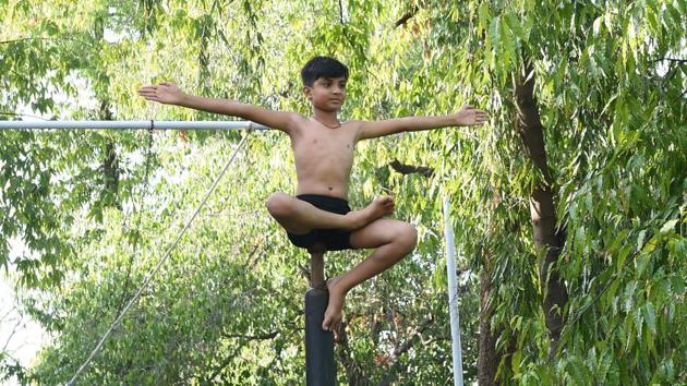 In earlier times Mallakhamnbh was a way to stay fit, but now it is considered as art rather than a method of training. (Toshifumi KITAMURA / AFP) In earlier times Mallakhamnbh was a way to stay fit, but now it is considered as art rather than a method of training. (Toshifumi KITAMURA / AFP)