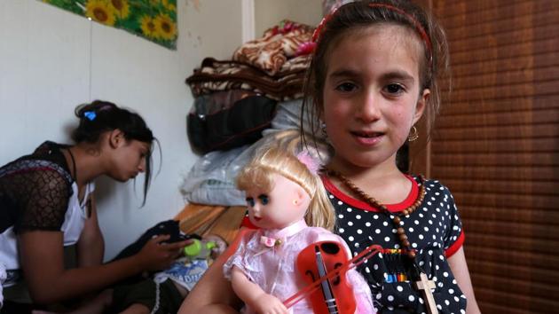 Christina, who was abducted by the Islamic State in August 2014, has been reunited with her family. (AFP) Christina, who was abducted by the Islamic State in August 2014, has been reunited with her family. (AFP)