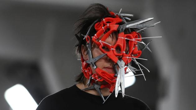 A model presents a creation at the MAN catwalk show at London Fashion Week Men's in London, Britain. (Neil Hall / REUTERS)